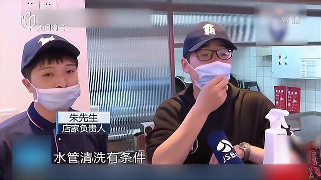 南京饭店引进炒菜机器人应对五一