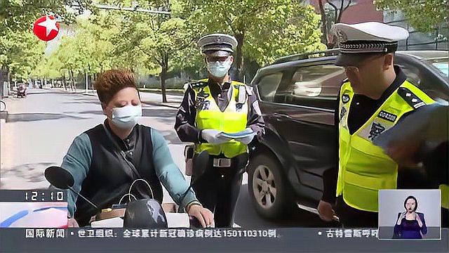 戴好头盔、不打电话 上海市“非机”新规今起实施:市民头盔佩戴率明显提高