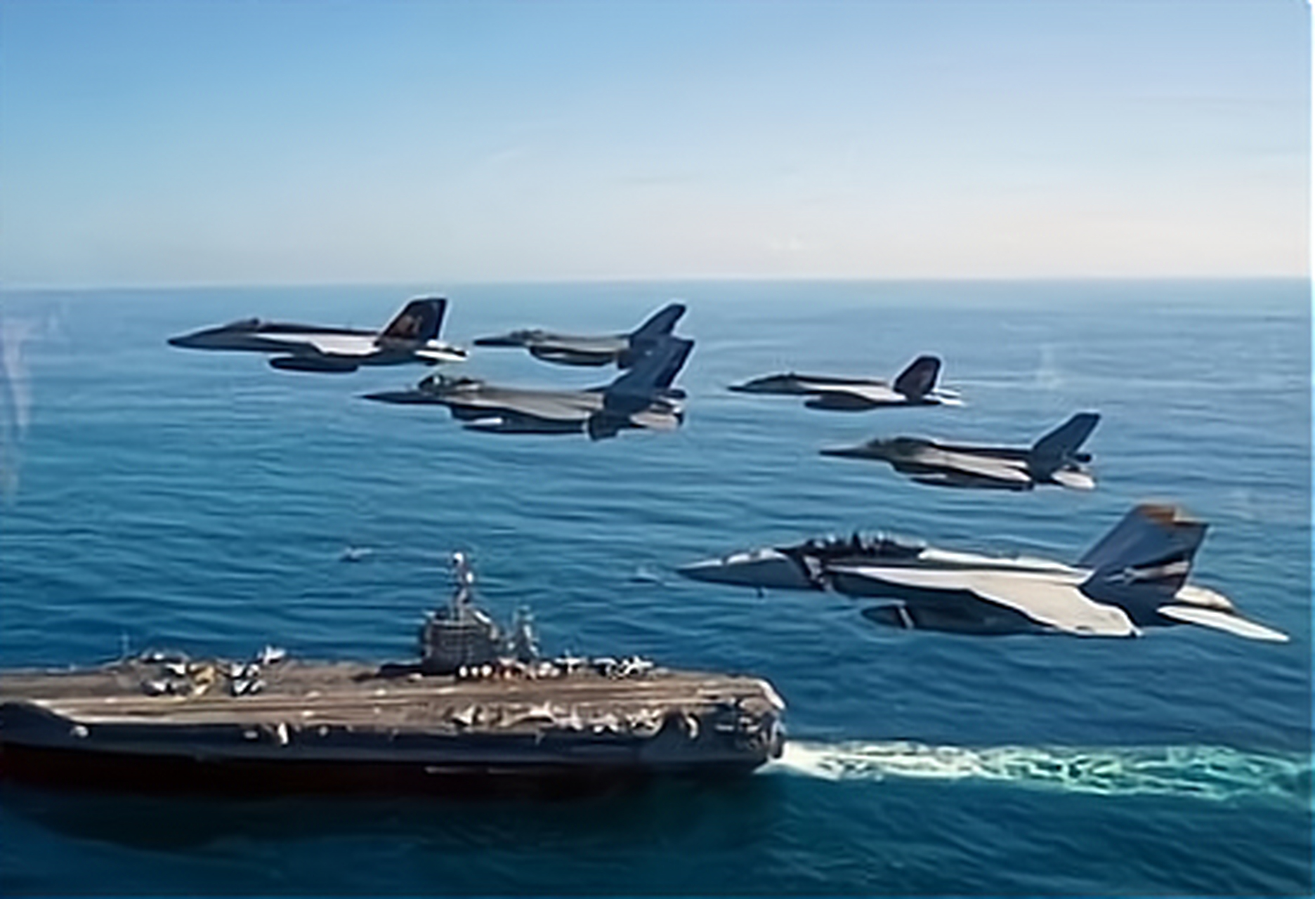 我国一艘攻击型核潜艇被美国"小鹰号"航空母舰跟踪,他们的反潜机和