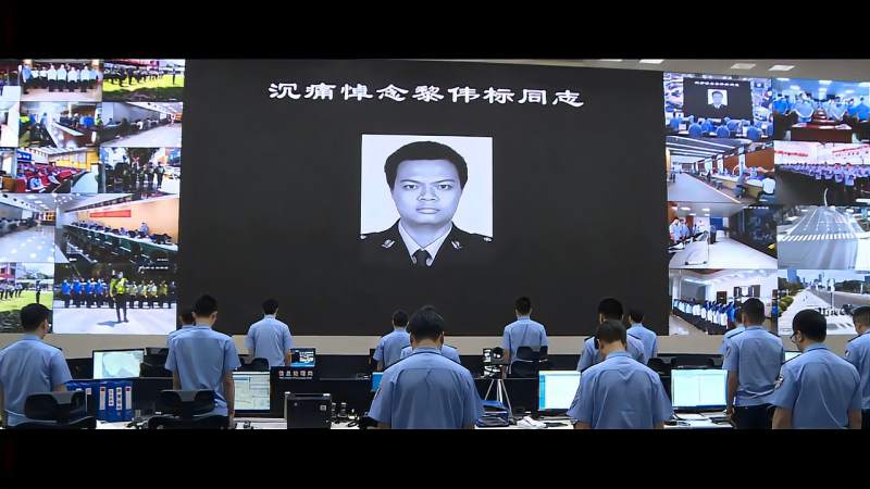 英雄已逝精神永存沉痛悼念黎伟标同志